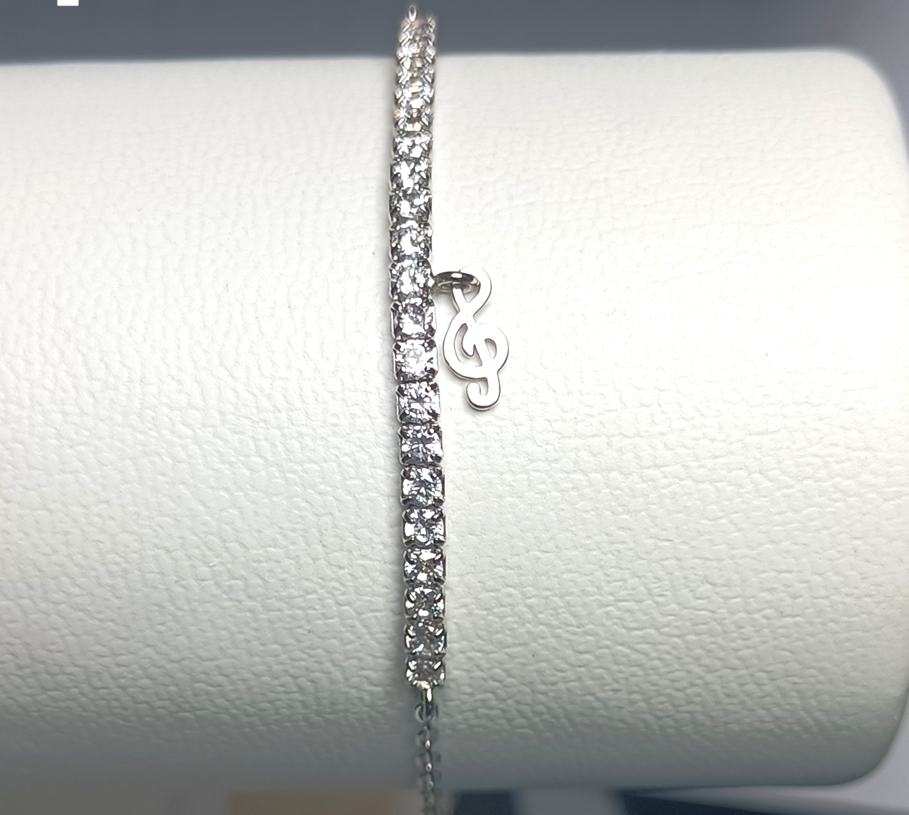 BRACCIALETTO SEMI TENNIS IN ARGENTO 925 E CHIAVE DI VIOLINO