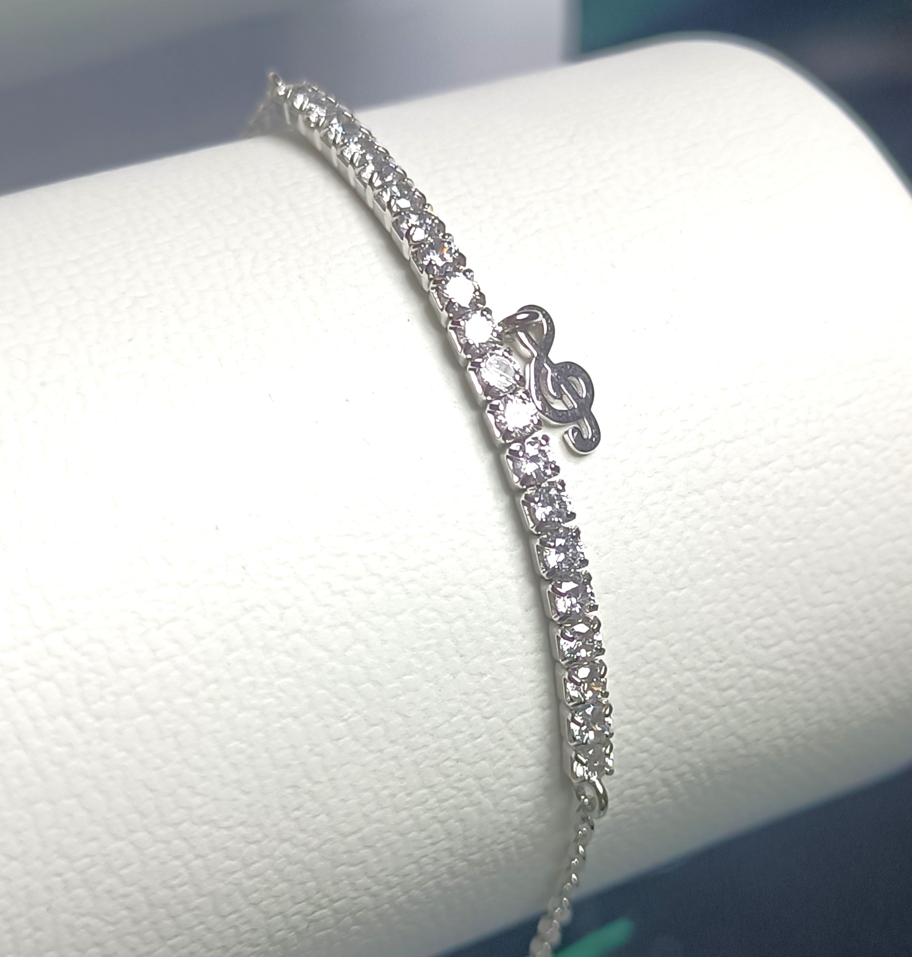 BRACCIALETTO SEMI TENNIS IN ARGENTO 925 E CHIAVE DI VIOLINO