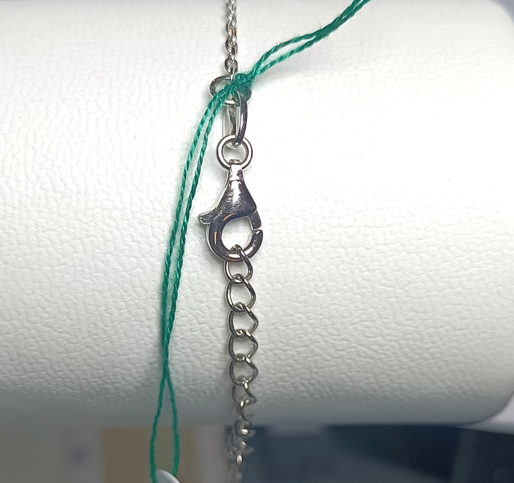 BRACCIALETTO SEMI TENNIS IN ARGENTO 925 E CHIAVE DI VIOLINO