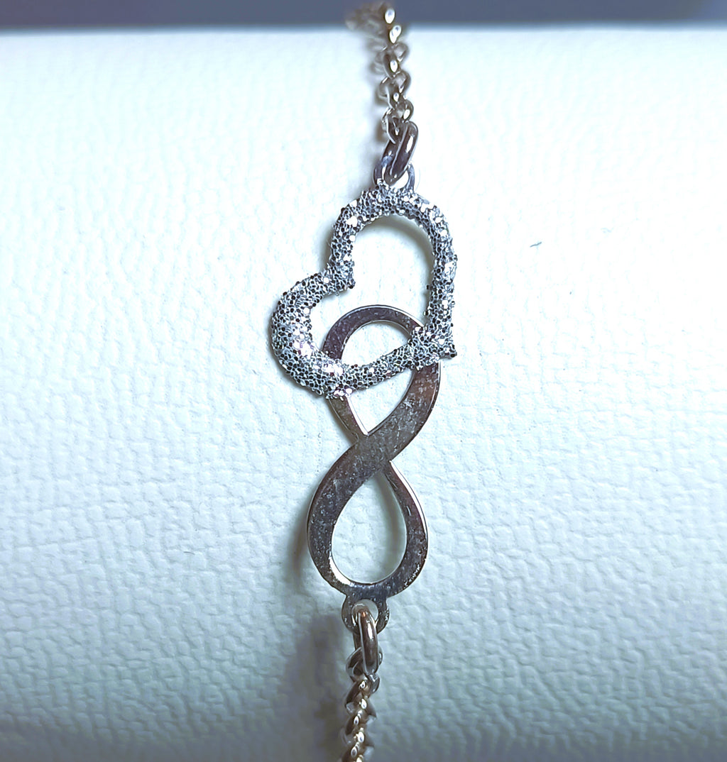BRACCIALE ARGENTO 925 SIMBOLO INFINITO E CUORE INCROCIATO