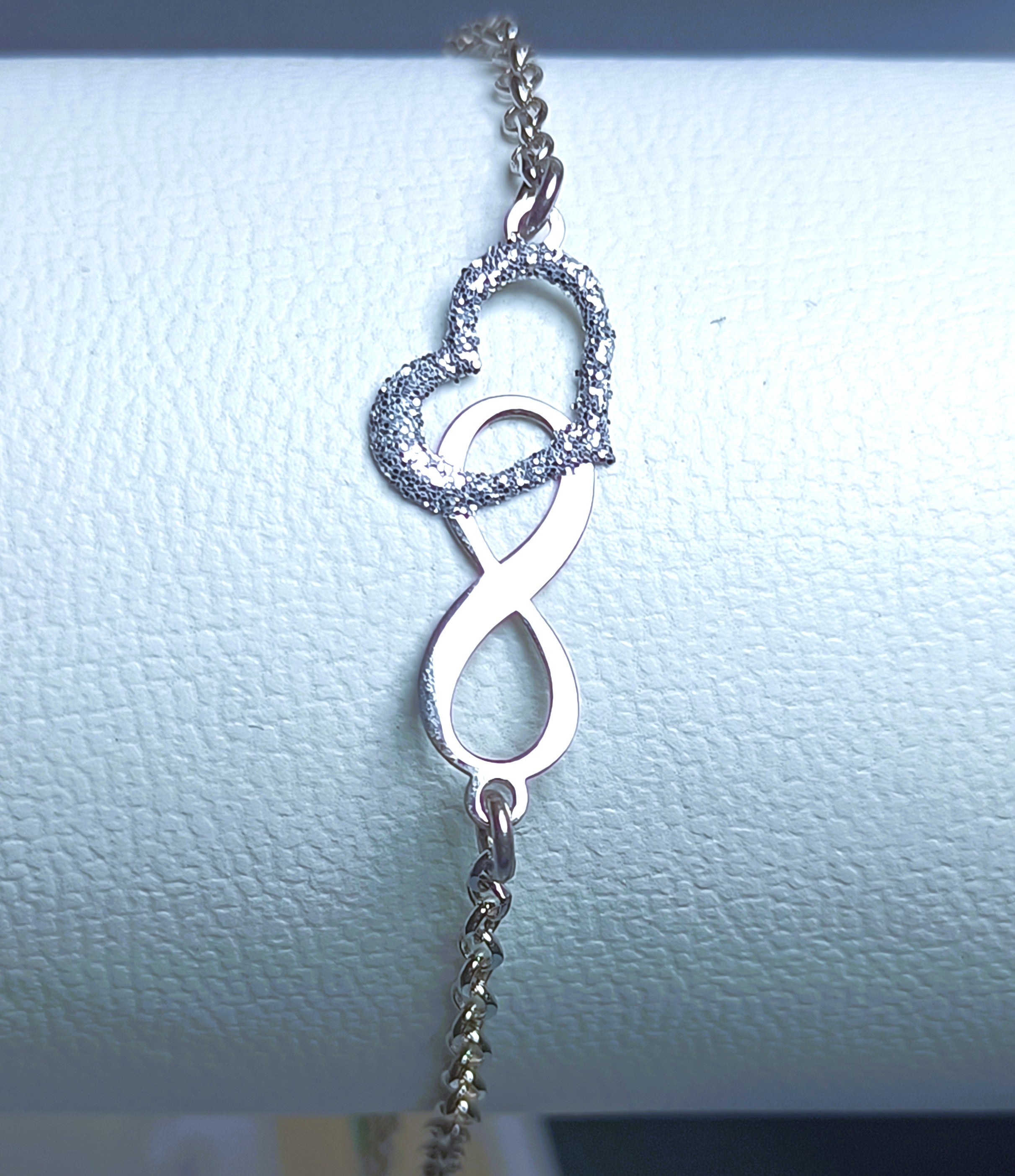 BRACCIALE ARGENTO 925 SIMBOLO INFINITO E CUORE INCROCIATO