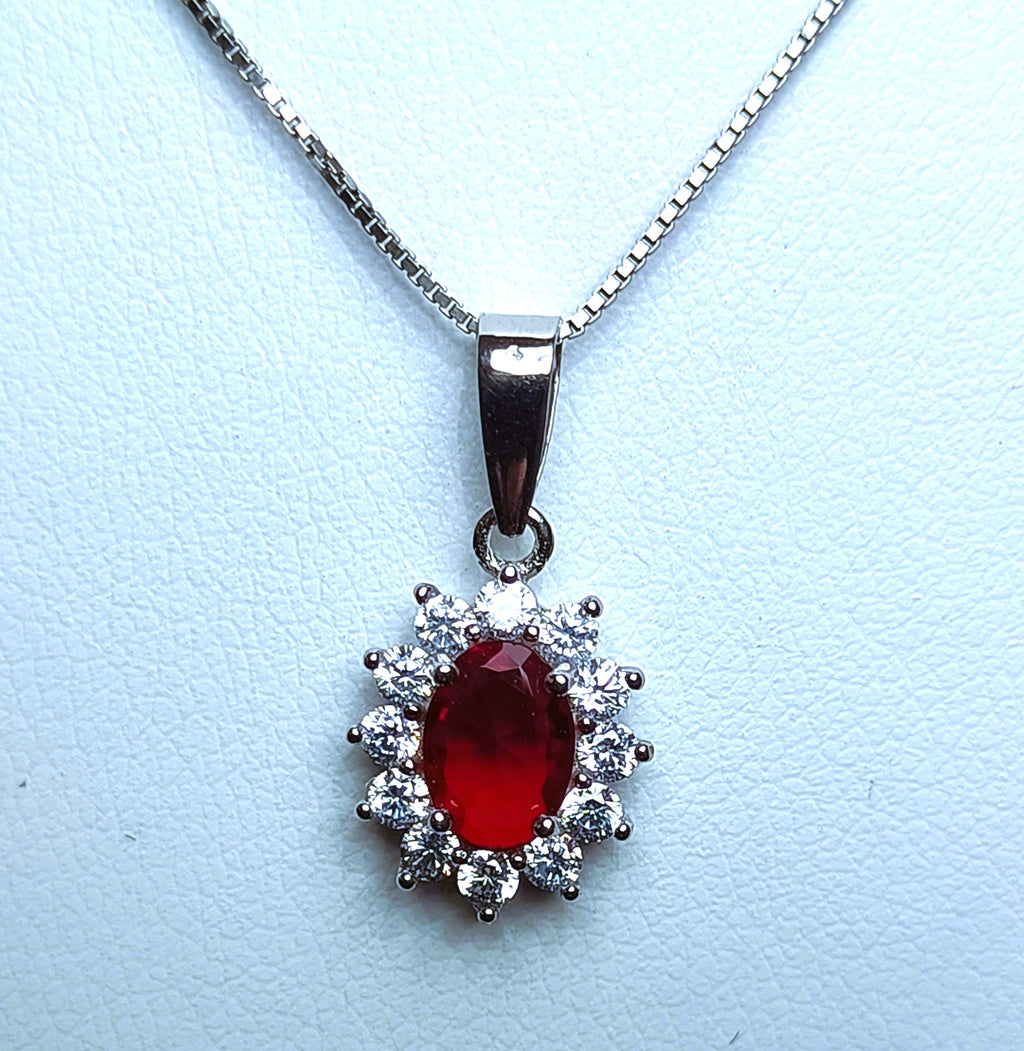 COLLANINA IN ARGENTO 925 CON PENDENTE OVALE E PIETRE LUMINOSE