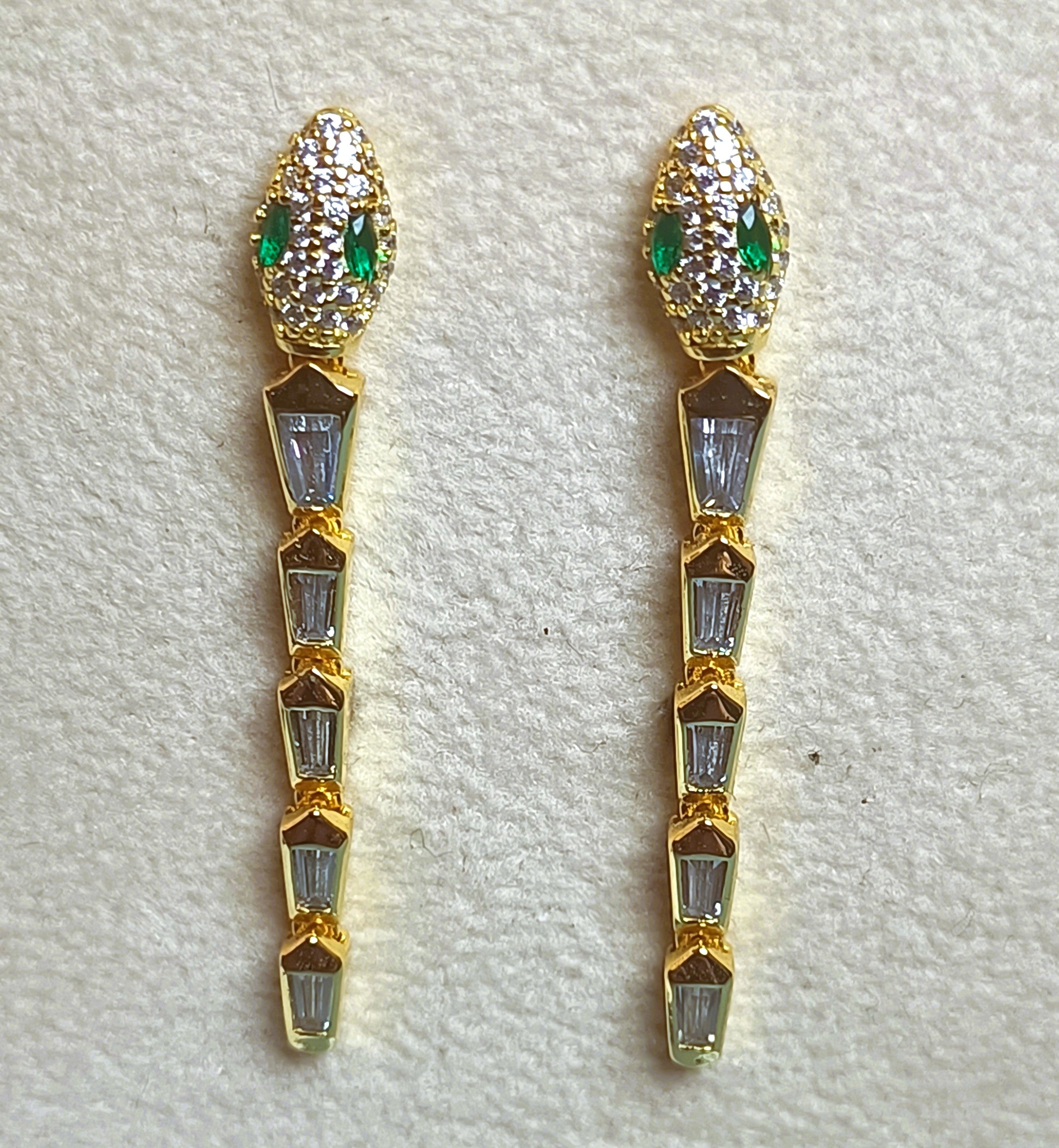 ORECCHINI DESIGN SERPENTE GIALLO IN ARGENTO 925 E PIETRE SUPER LUMINOSE