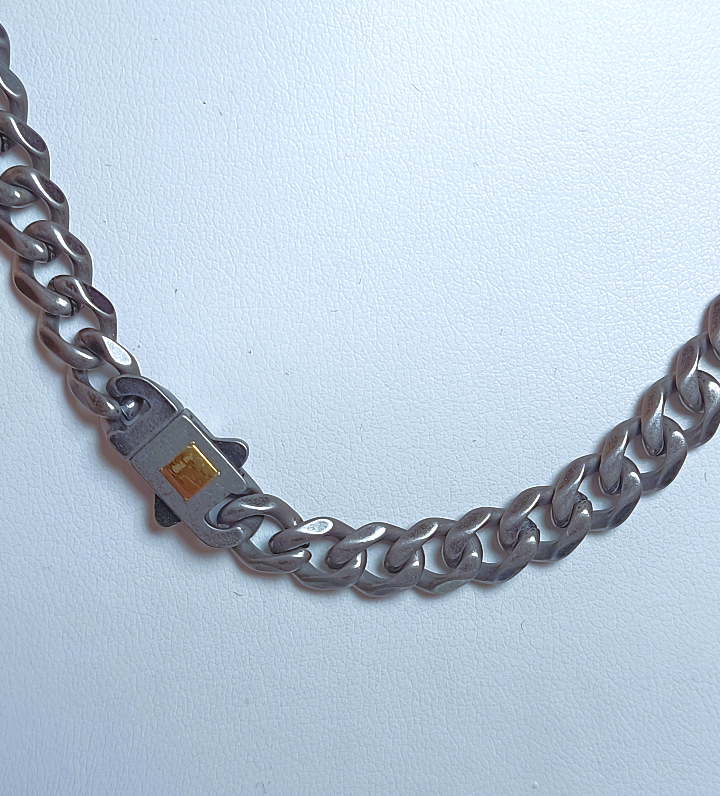 COLLANA IN ACCIAIO ANALLERCICO ED ORO 18KT GIALLO DELLA "ROSSO AMANTE "