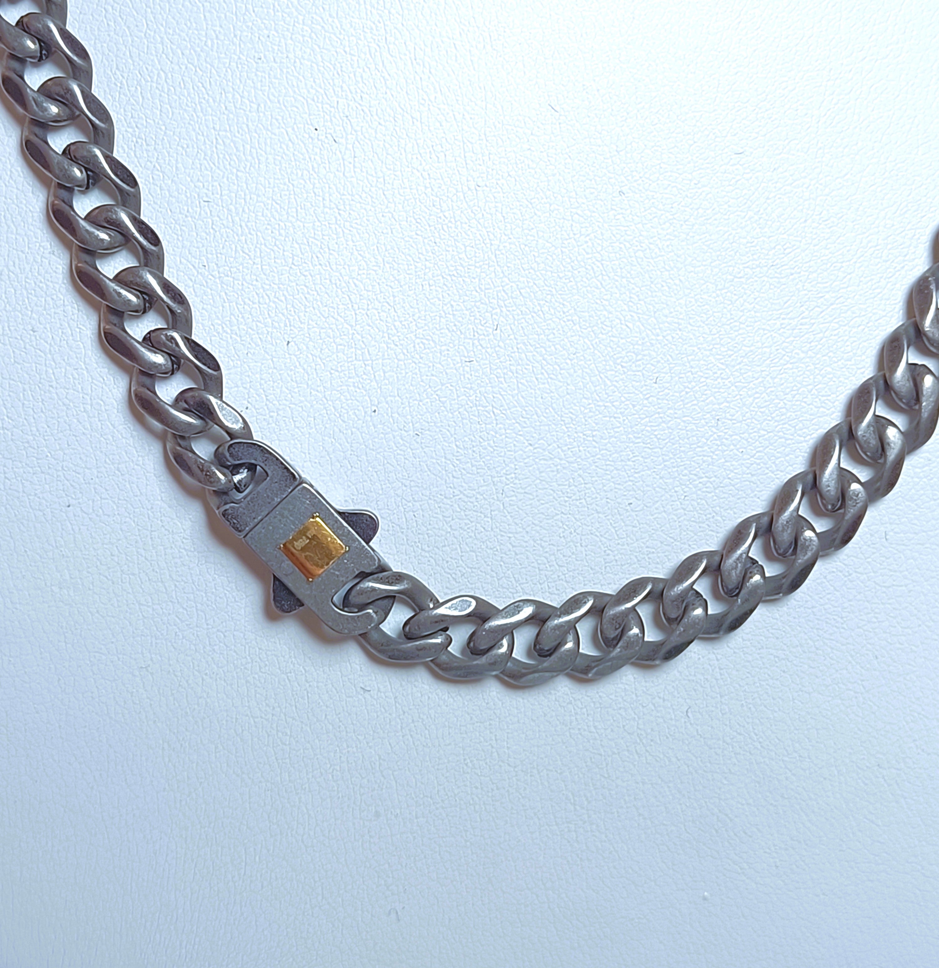 COLLANA IN ACCIAIO ANALLERCICO ED ORO 18KT GIALLO DELLA "ROSSO AMANTE "
