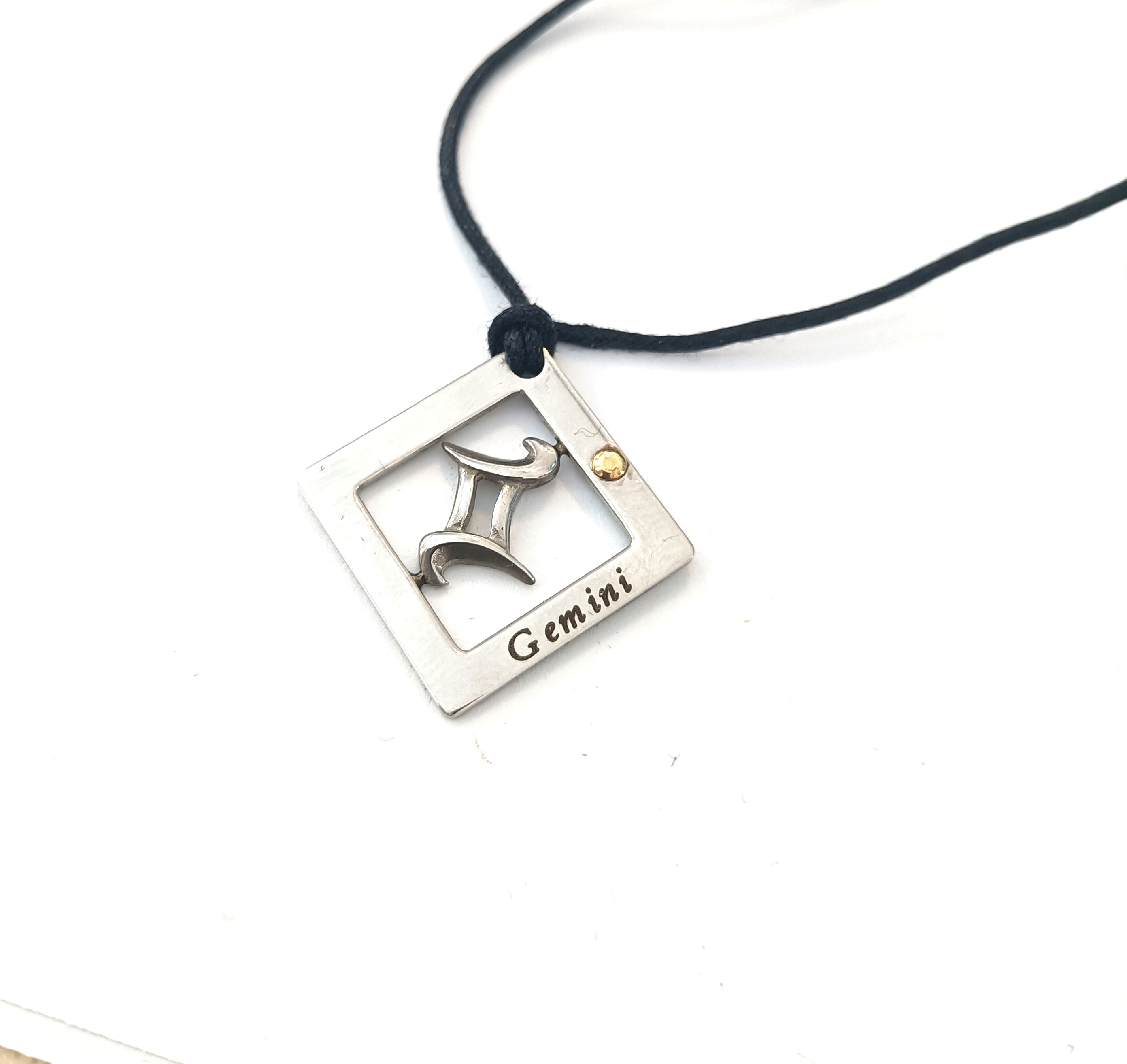 COLLINI SEGNI ZODIACALI ACCIAIO E ORO 18KT